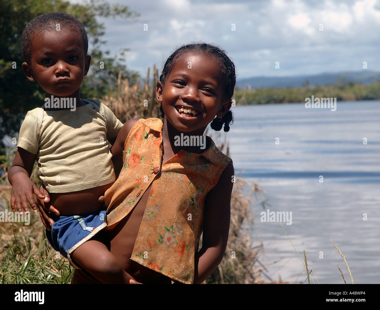 Brother and sister next to the river Soaniera Ivongo eastern Madagascar Stock Photo