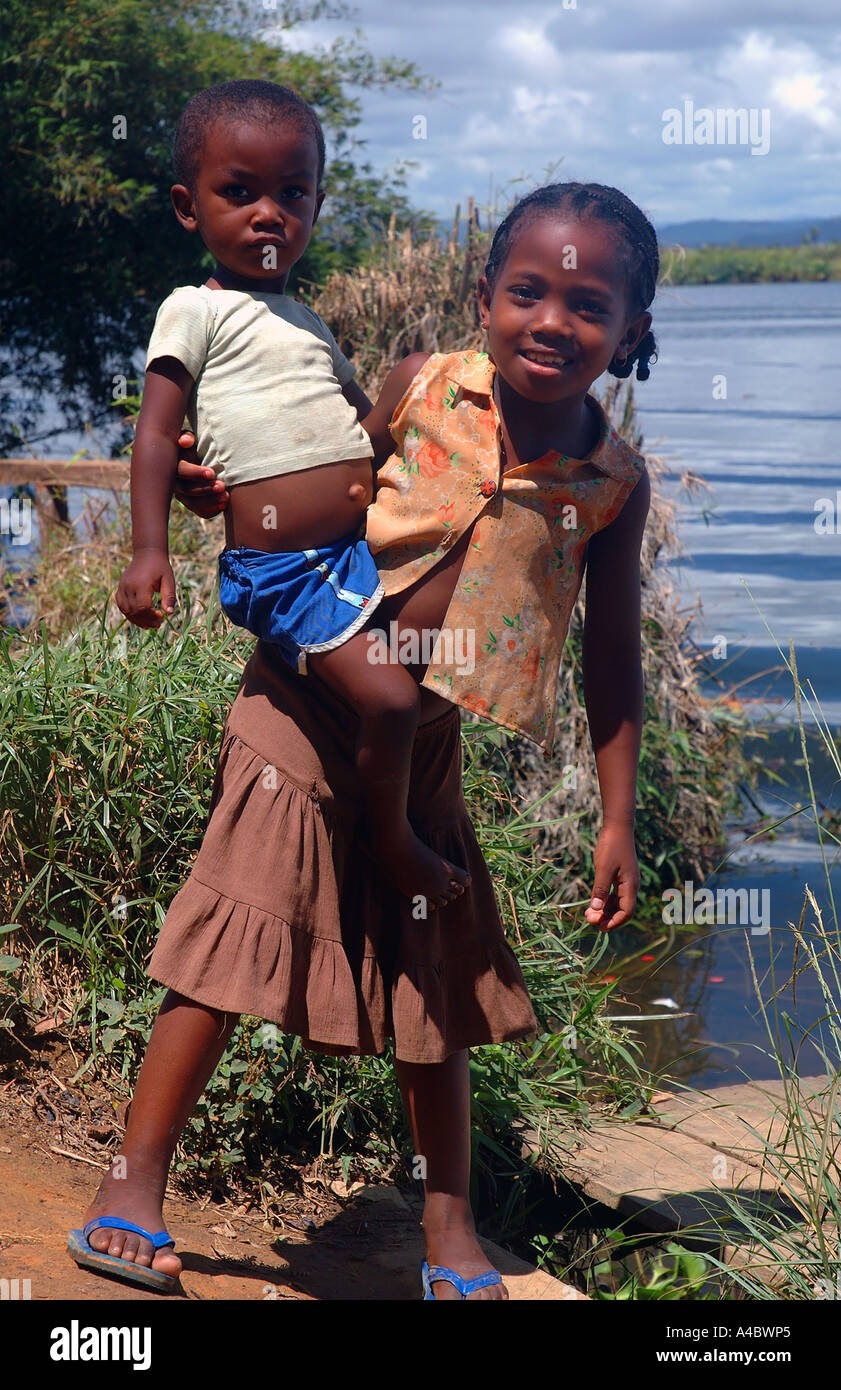 Brother and sister next to the river Soaniera Ivongo eastern Madagascar Stock Photo