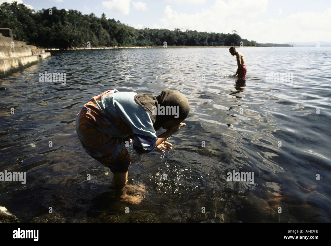 Bathing muslim hi-res stock photography and images - Alamy