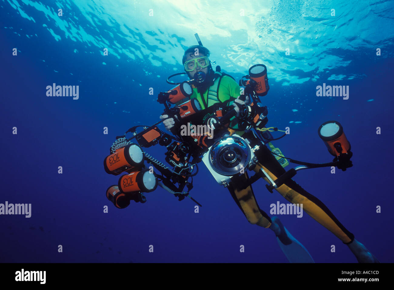 UNDERWATER PHOTOGRAPHER AND A MYRIAD OF UNDERWATER CAMERAS Stock Photo