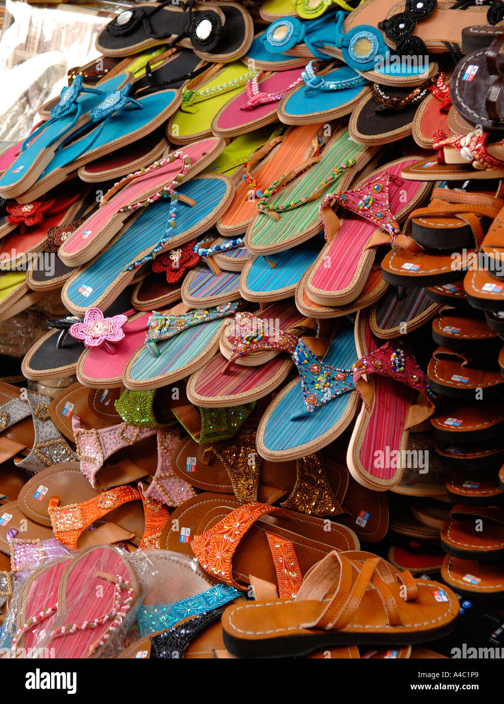 Brightly coloured sandals for sale, Ubud Street market Bali Indonesia ...