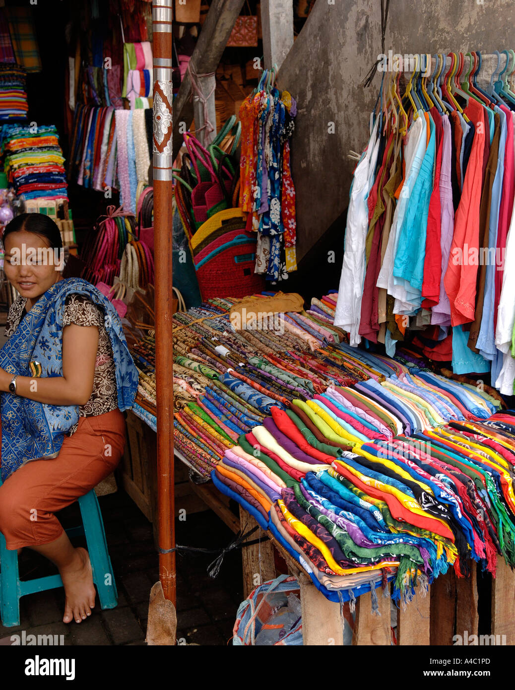 Balinese shop girl at Ubud street market, Bali Indonesia Stock Photo - Alamy