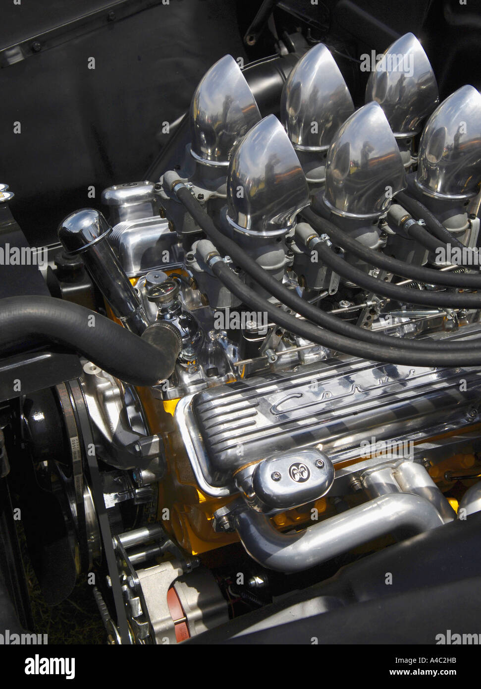Engine intake carburater manifolds on hot rod Stock Photo Alamy