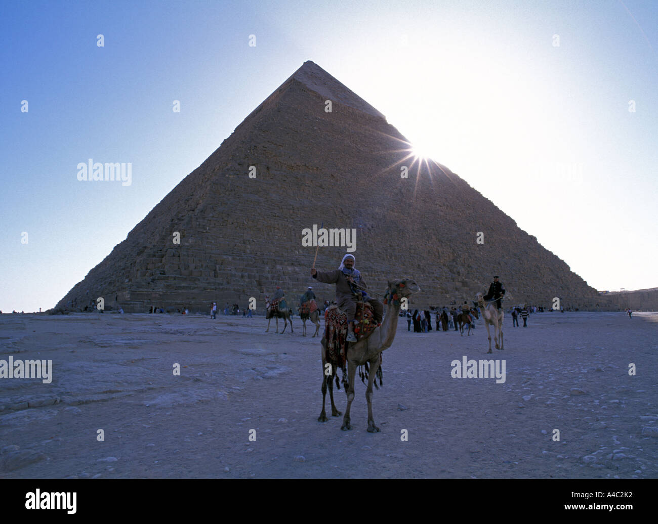 Camel rider with the pyramid behind Giza Egypt Stock Photo - Alamy