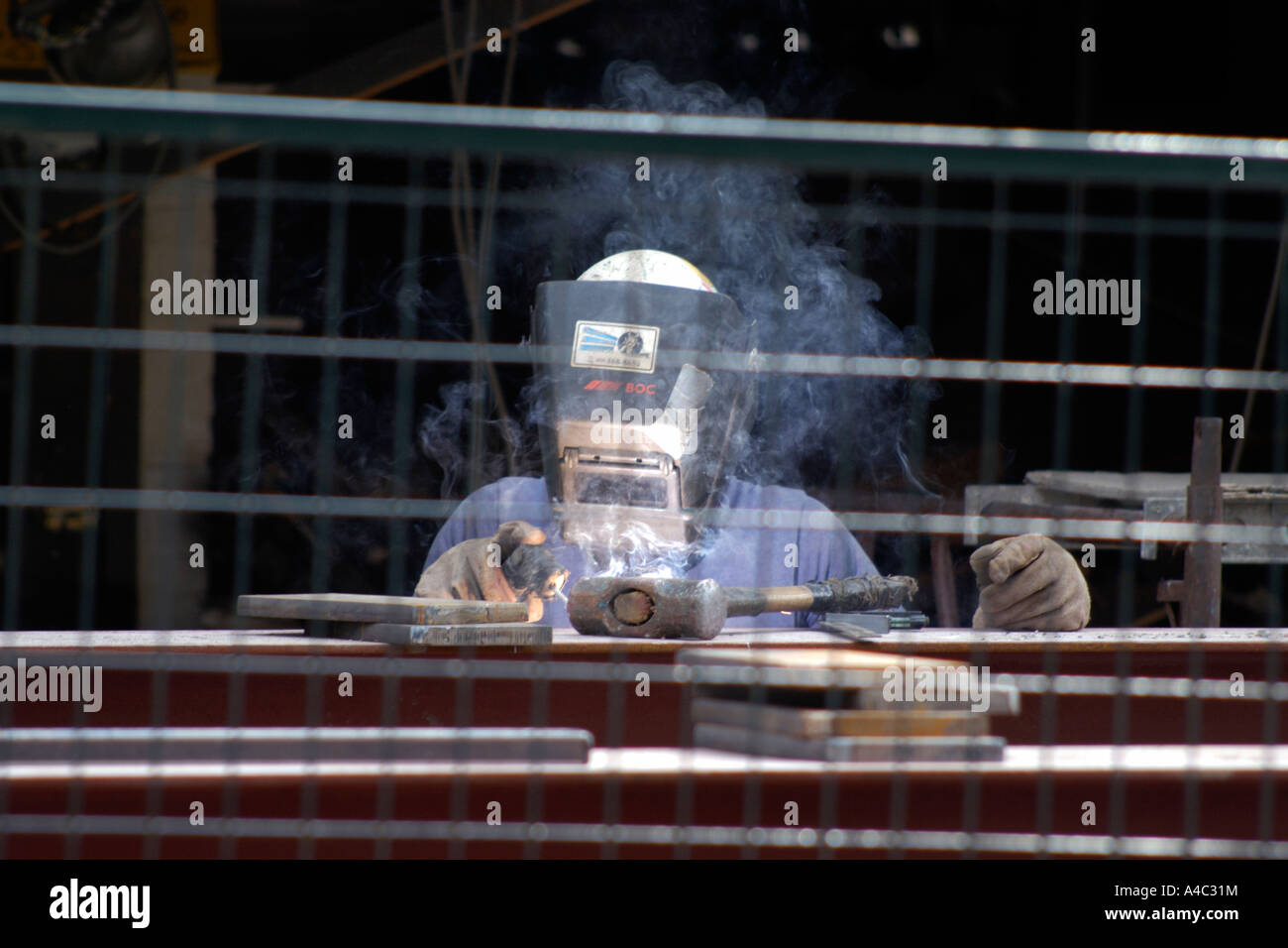 Welder on construction site Stock Photo