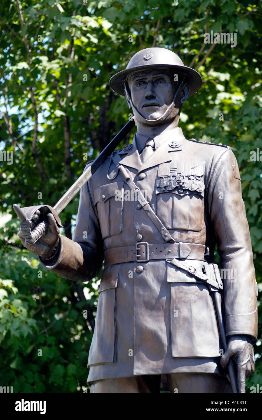 Statue of soldier with a sword on his shoulder Stock Photo