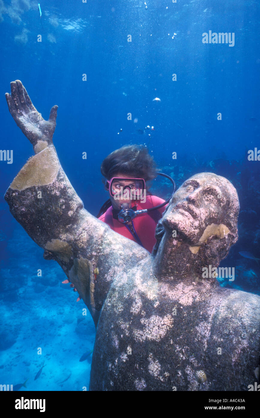 SCUBA DIVER AND STATUE OF CHRIST OF THE ABYSS FLORIDA KEYS NATIONAL