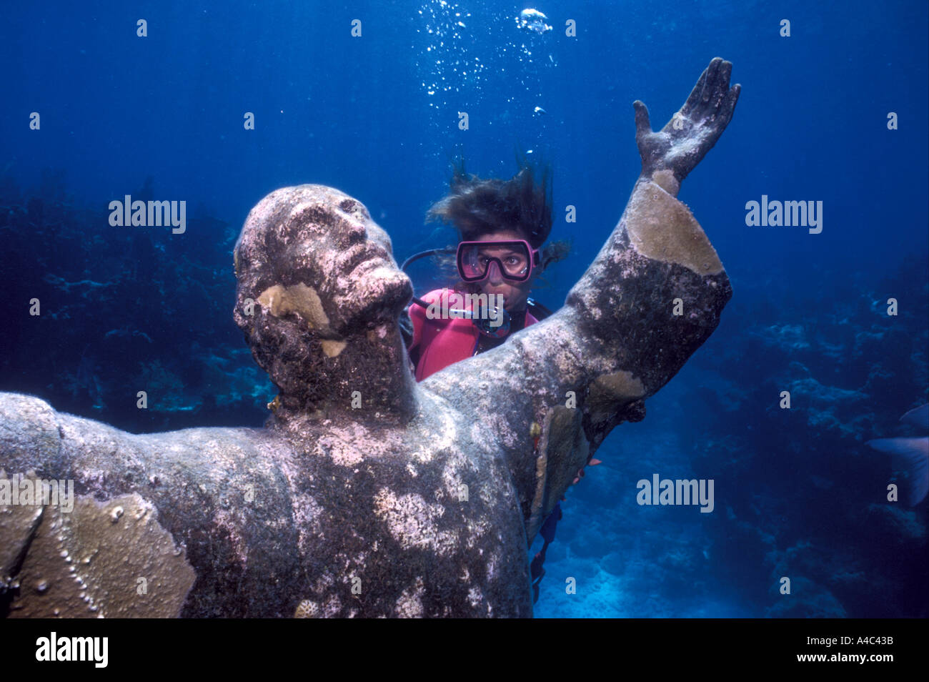 SCUBA DIVER AND STATUE OF CHRIST OF THE ABYSS FLORIDA KEYS NATIONAL MARINE SANCTUARY KEY LARGO