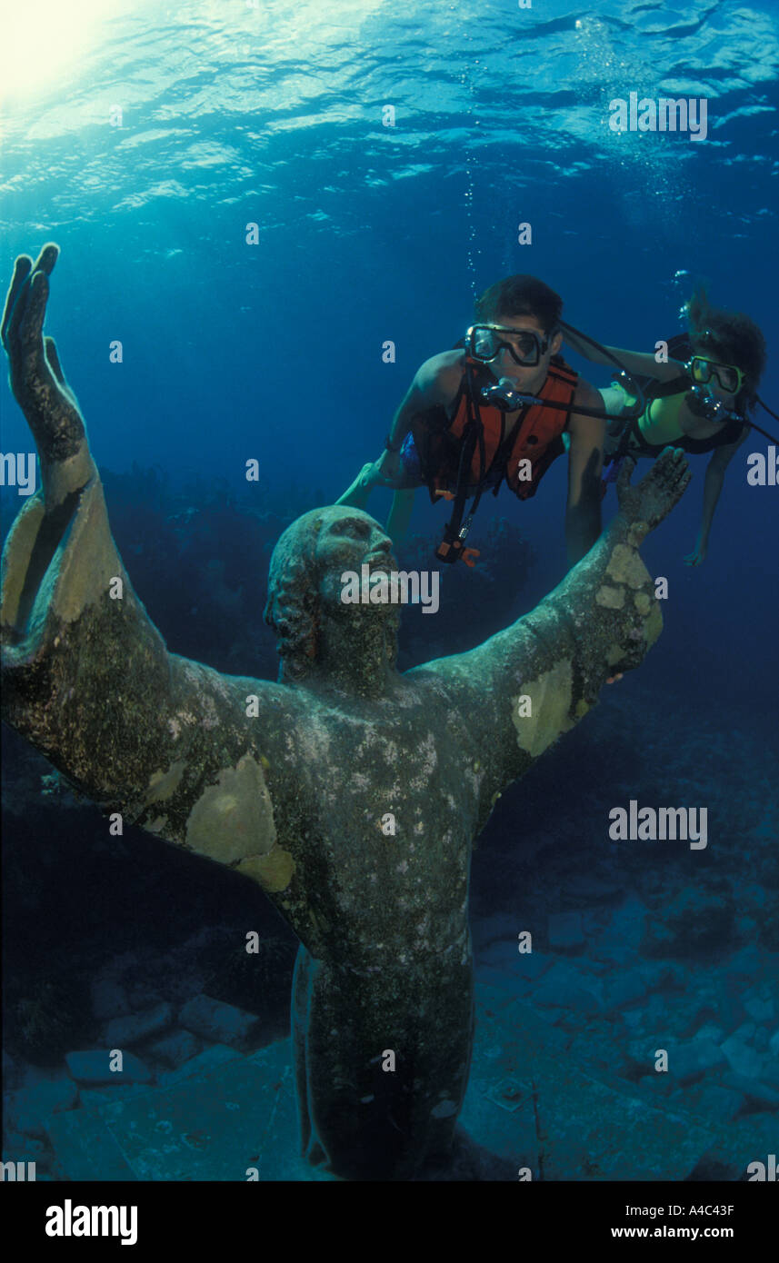 SCUBA DIVERS AND STATUE OF CHRIST OF THE ABYSS FLORIDA KEYS NATIONAL