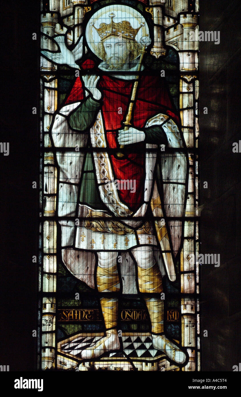 Stained-glass window of St. Oswald in St. Oswald's Church, Grasmere, Lake District, England, UK. Stock Photo