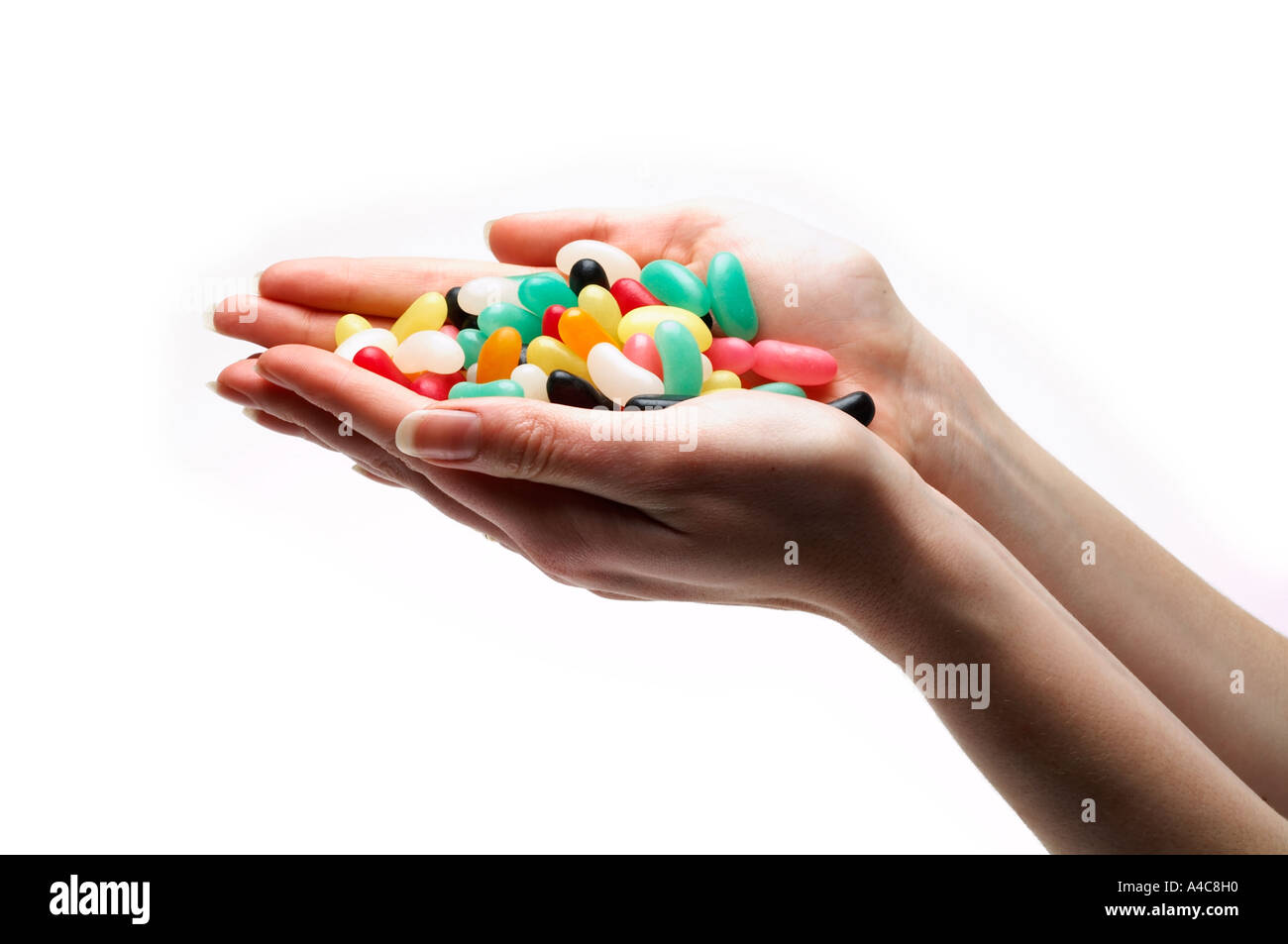 hands, full, gift, giving, palm, give, Jelly, beans, candy, sweet, sweets, sweeties, confectionery, tooth, decay, fillings, dent Stock Photo