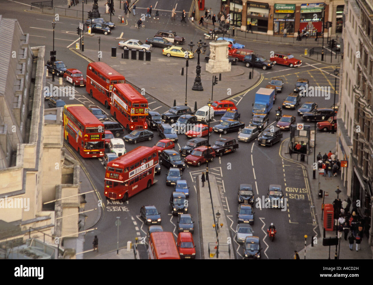 Gridlocked Traffic With London Red Buses Black Cabs Taxis Private
