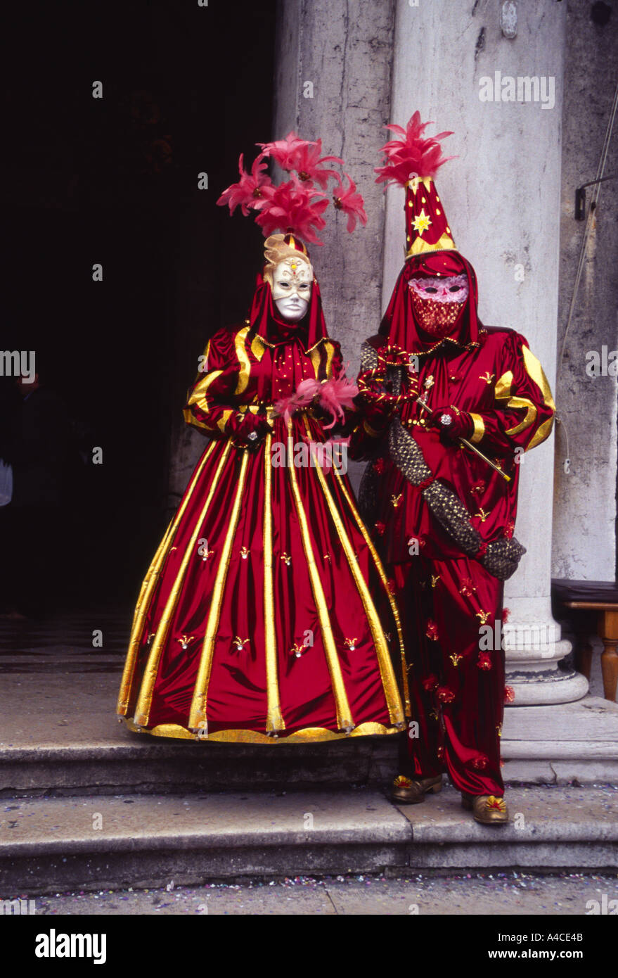 Italy Venice Carnival Masks red gold costume white mask Stock Photo - Alamy