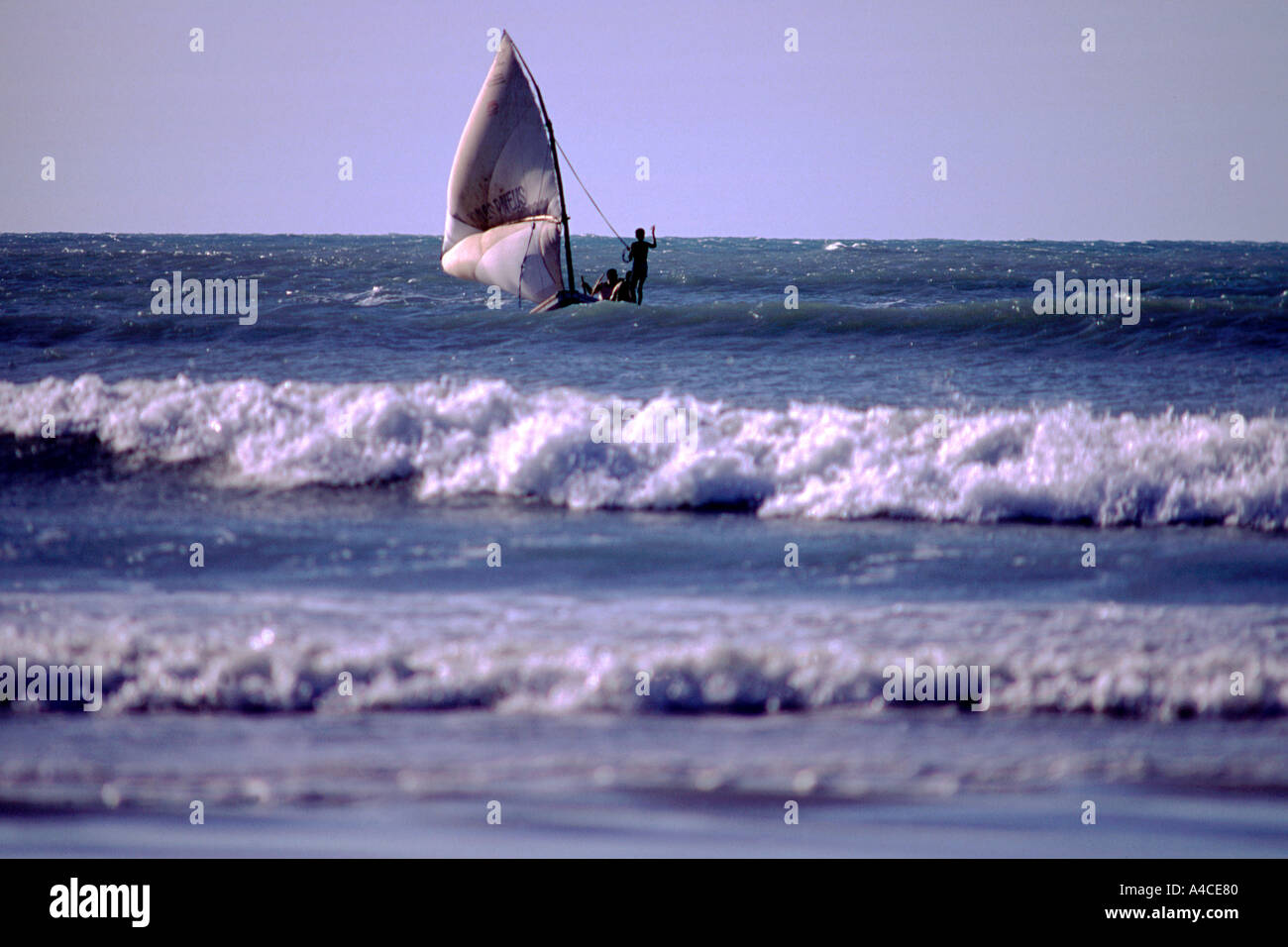Sail boat crossing the waves Brazil Stock Photo