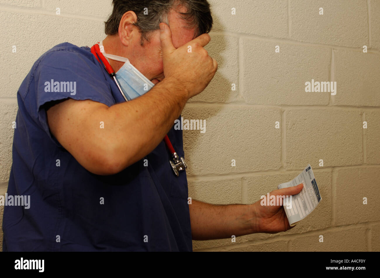 Surgeon laid off Stock Photo - Alamy