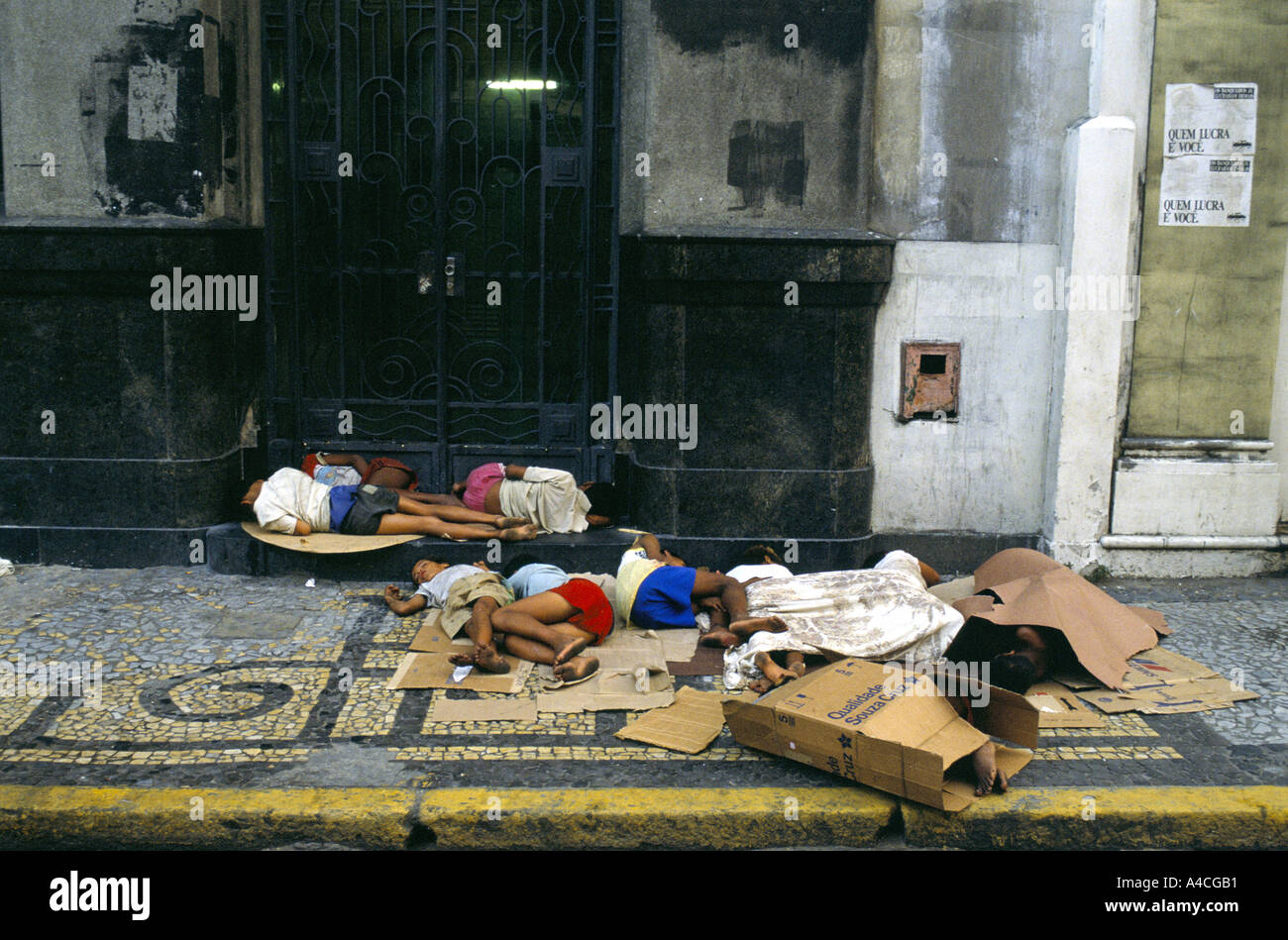 Recife, Brazil. Homeless children sleep on the street. Stock Photo