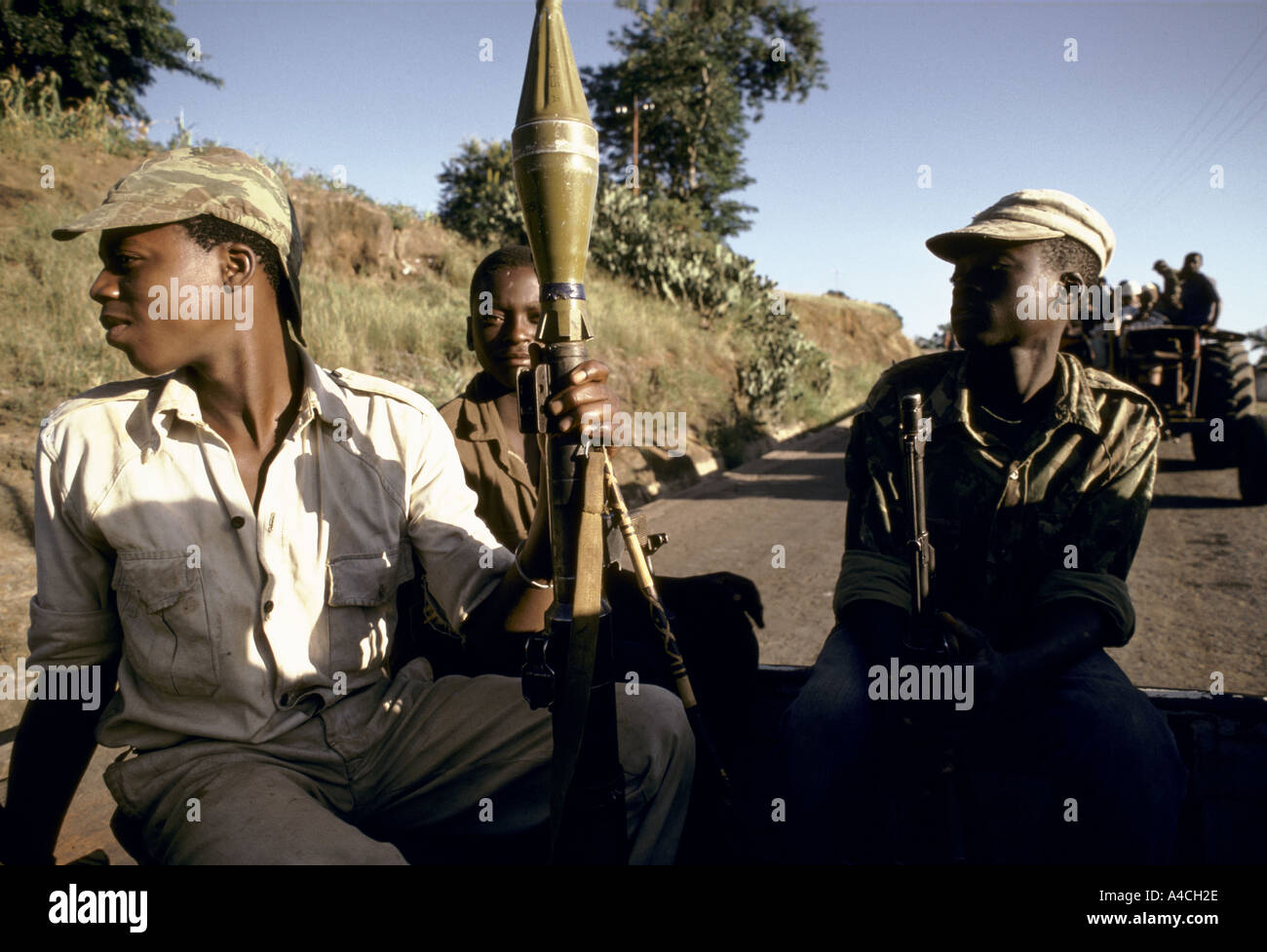 soldier carrying rocket propelled grenade launcher in mozambique frelimo  civil guard convoy Stock Photo - Alamy