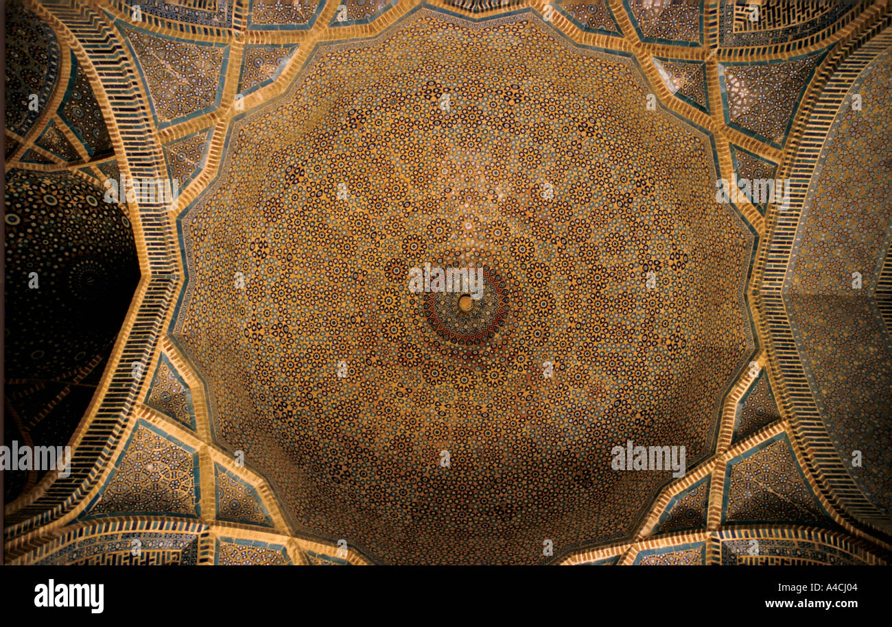Intricate tilework and art decorate the interior of the dome at the Shah Jehan Mosque, Thatta, Pakistan Stock Photo