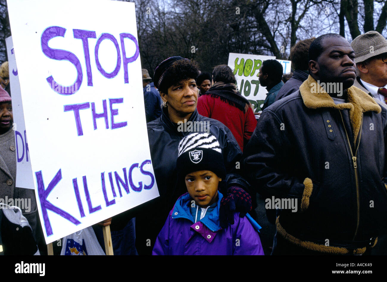 A BOY CARRIES A BANNER ON A PEACE MARCH TO PROTEST AGAINST THE KILLING OF BENJI STANLEY WHO WAS SHOT DEAD Stock Photo