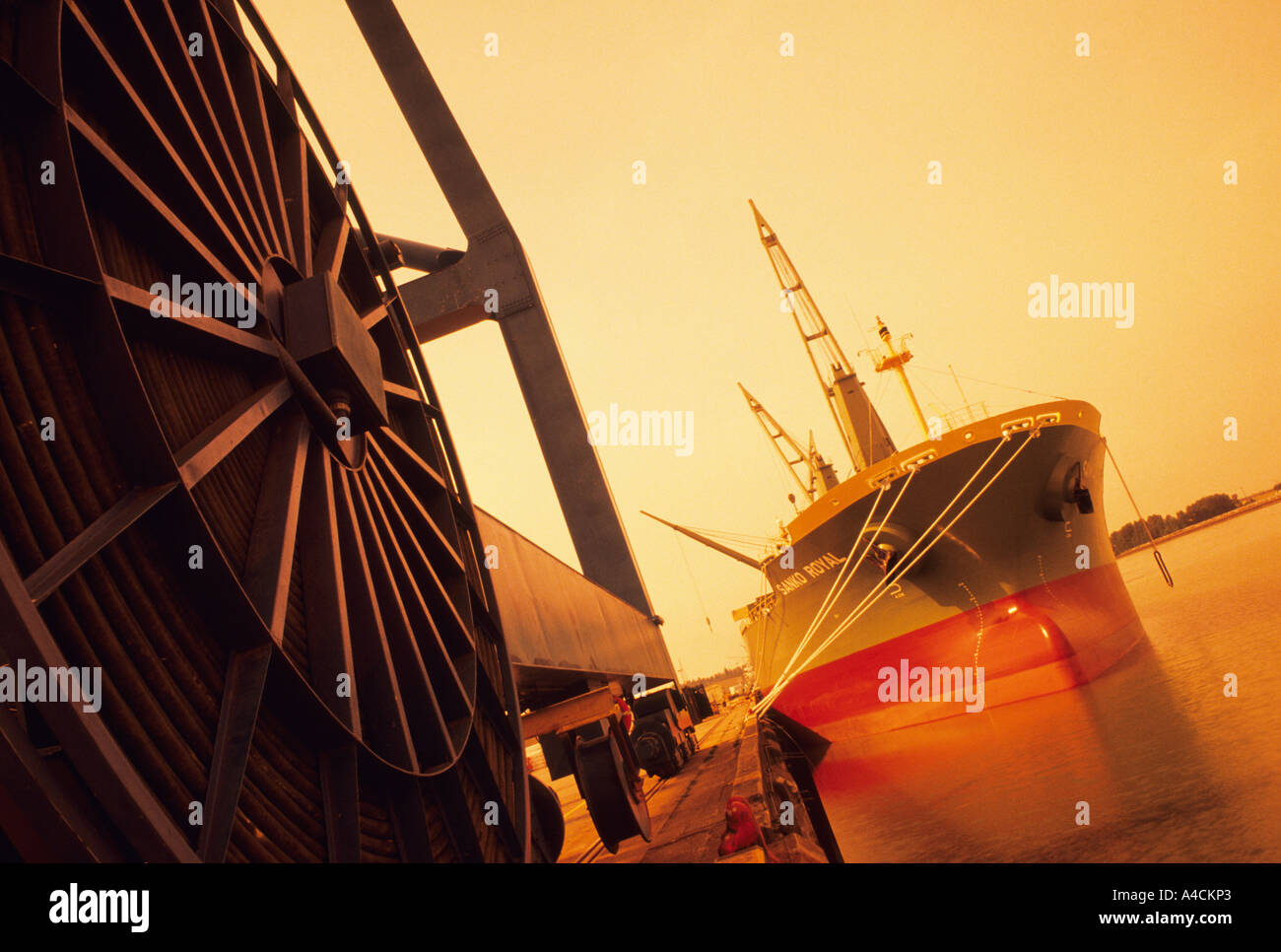 Freighter and shipping crane Stock Photo - Alamy