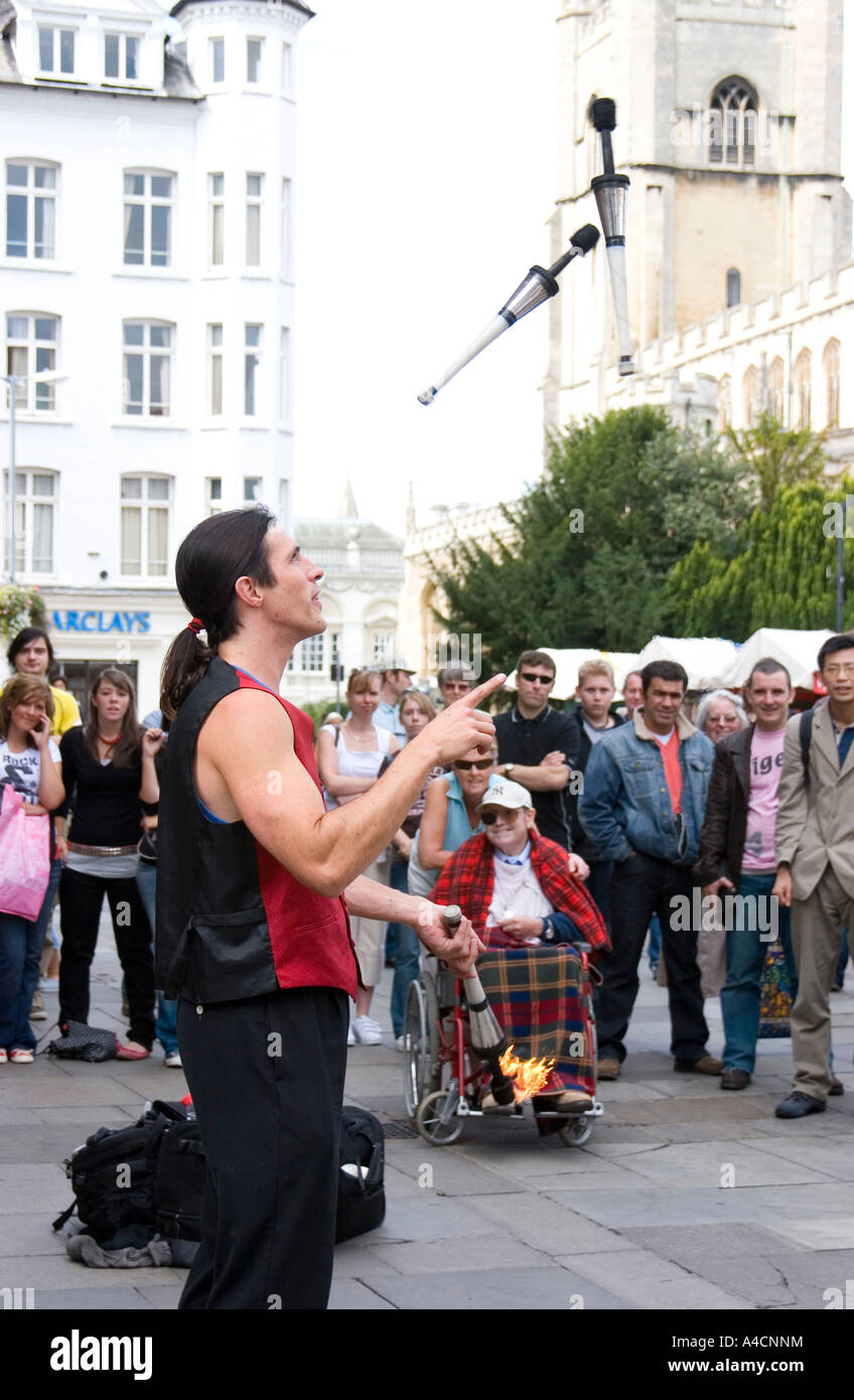 Street performer juggling in Cambridge market squaer, England Stock Photo