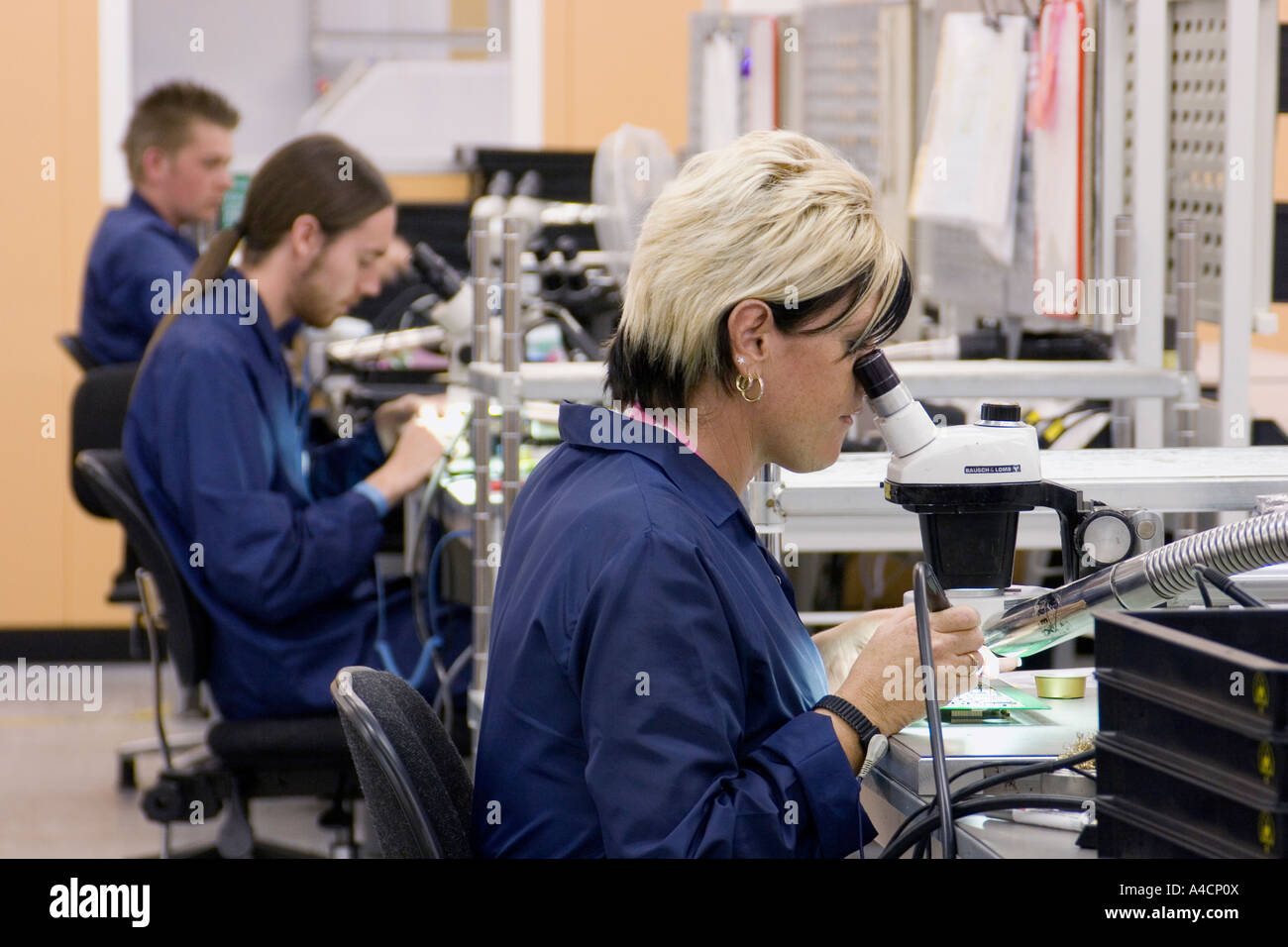 Micro electronics technicians at CMAC's factory in Great Yarmouth Stock Photo