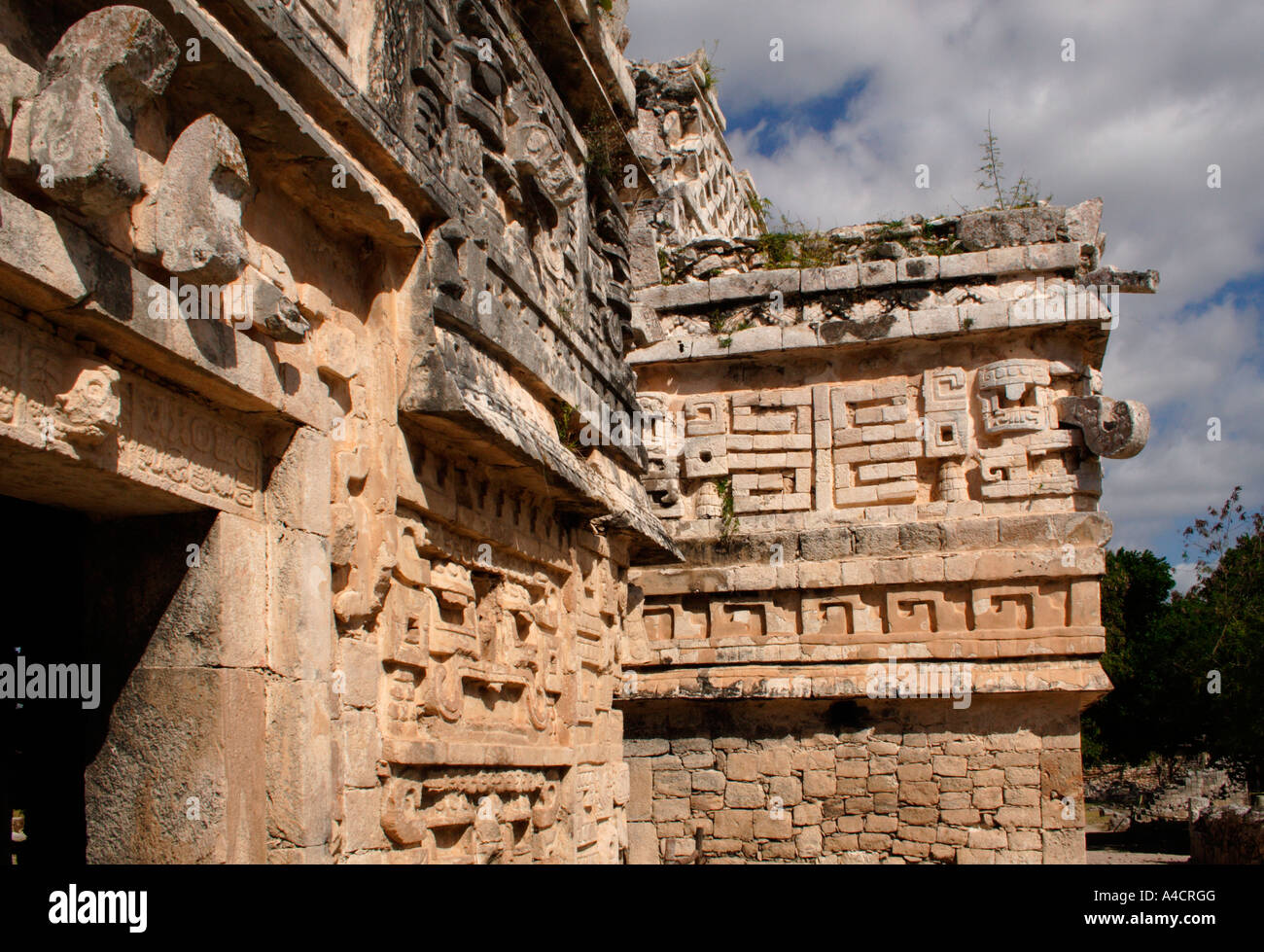 Chichen Itza's Puuc style buildings named for the Puuc Hills near Uxmal in Northern Yucatan feature the Rain God Chaac. Stock Photo