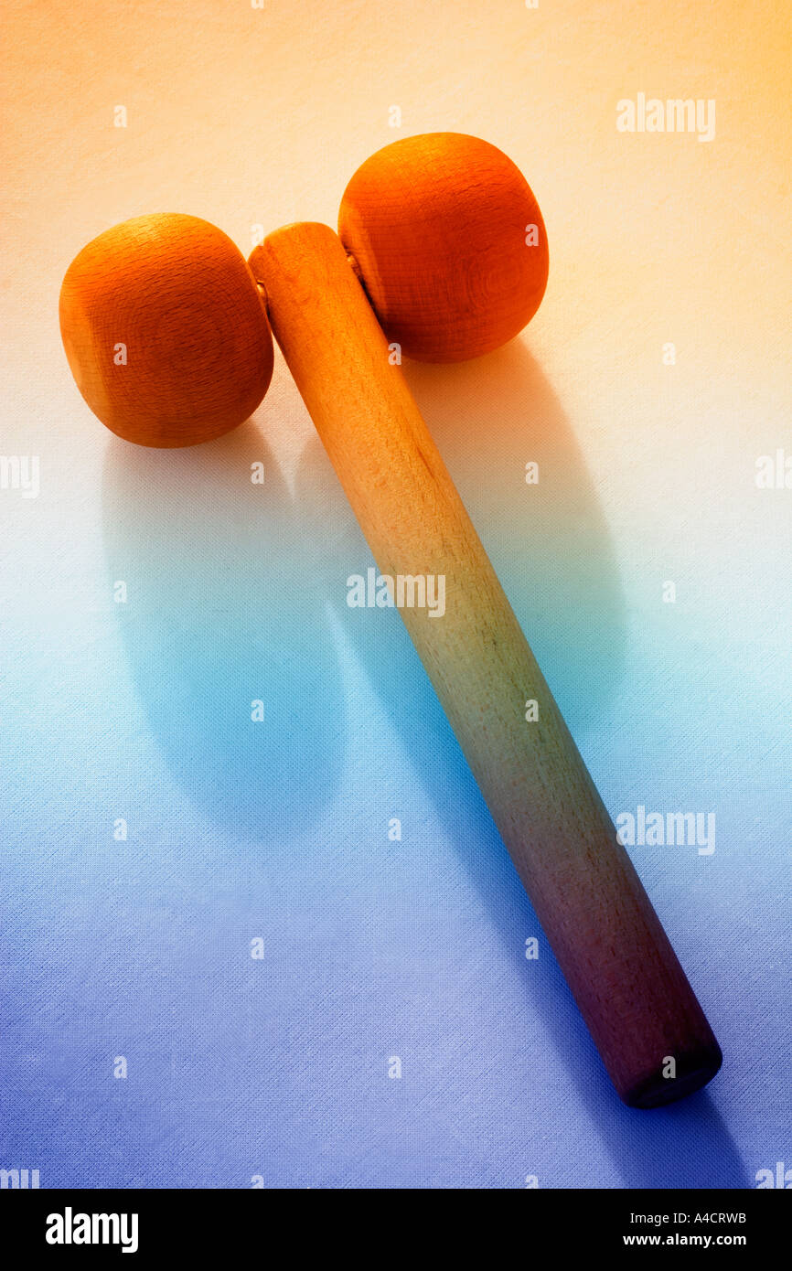 One wooden body massage device, with two rolling wooden balls and hand grip Stock Photo