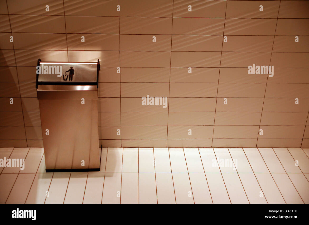 Garbage can in public bathroom Stock Photo Alamy