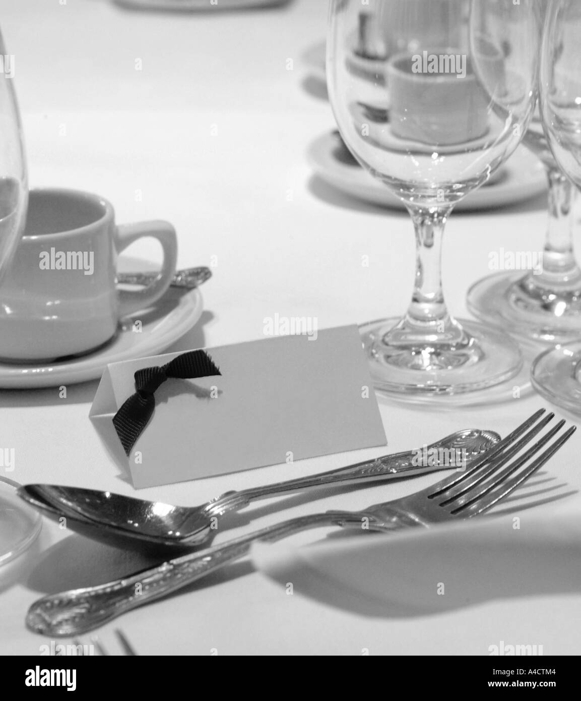 details of table setting before eating with blank name card for creative interpretation or addition offering a personal touch Stock Photo