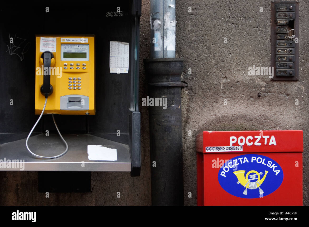 POLAND, GDANSK, 25.12.2006. Polish outdoor telephones and mailbox Stock Photo