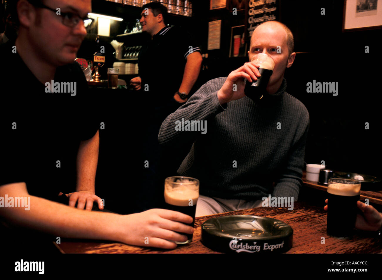 Drinking in Ye Olde Mitre Public House, London,  UK Stock Photo