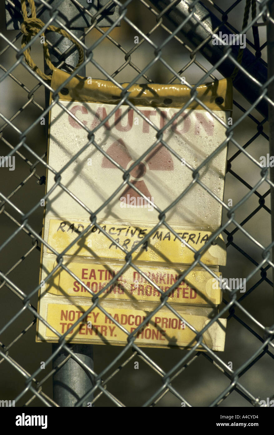 The fence around the radioactive dump with a warning sign. Canonsburg