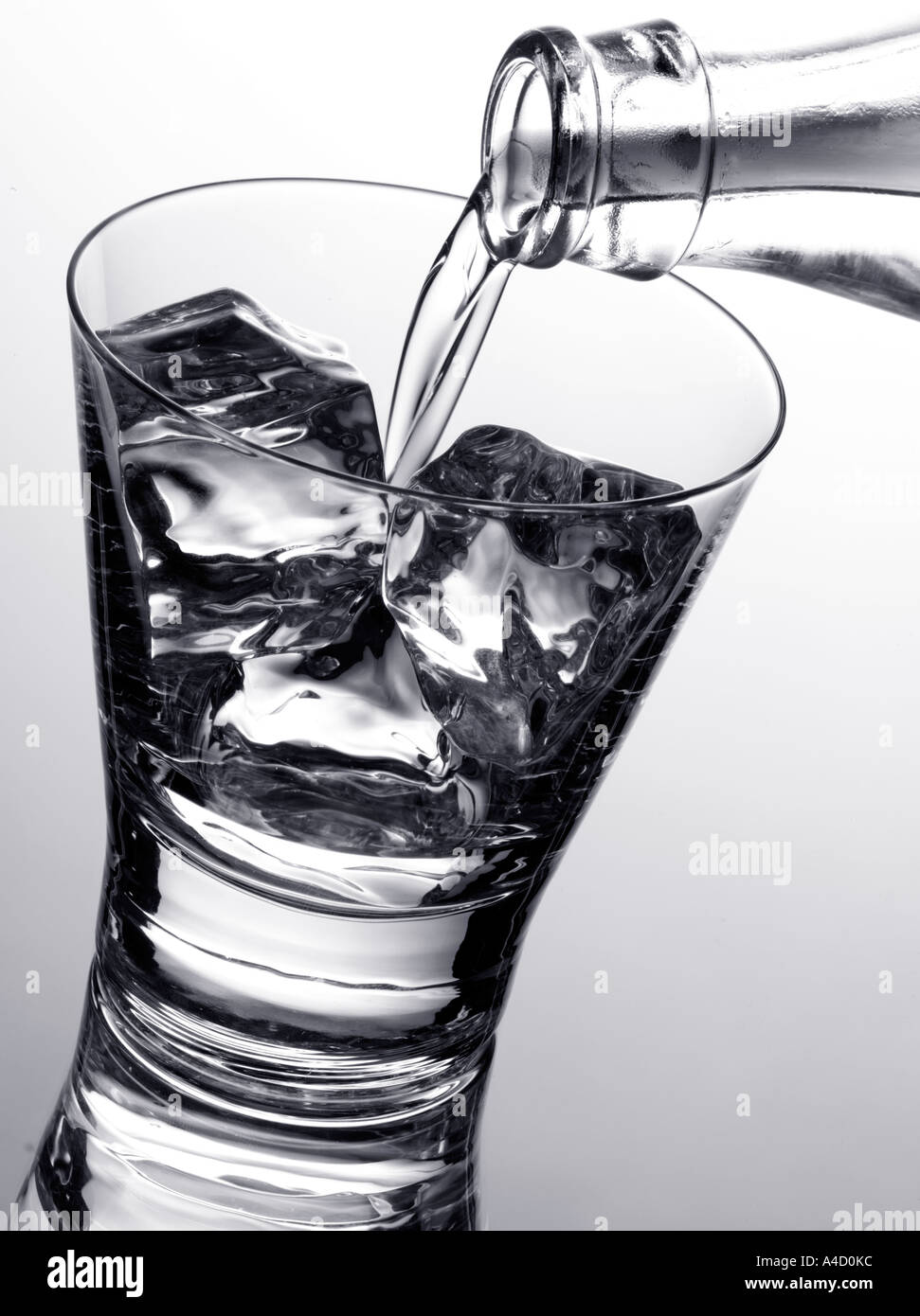 POURING GREEK OUZO ON ICE Stock Photo Alamy