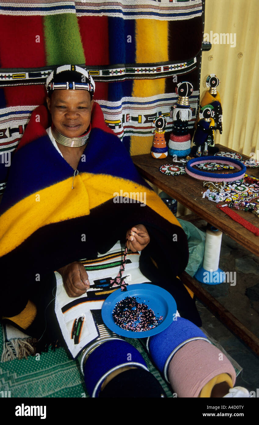 People, woman, ethnic, Ndebele dress, making traditional bead curios Pilgrims Rest, Mpumalanga, South Africa, selling artwork Stock Photo