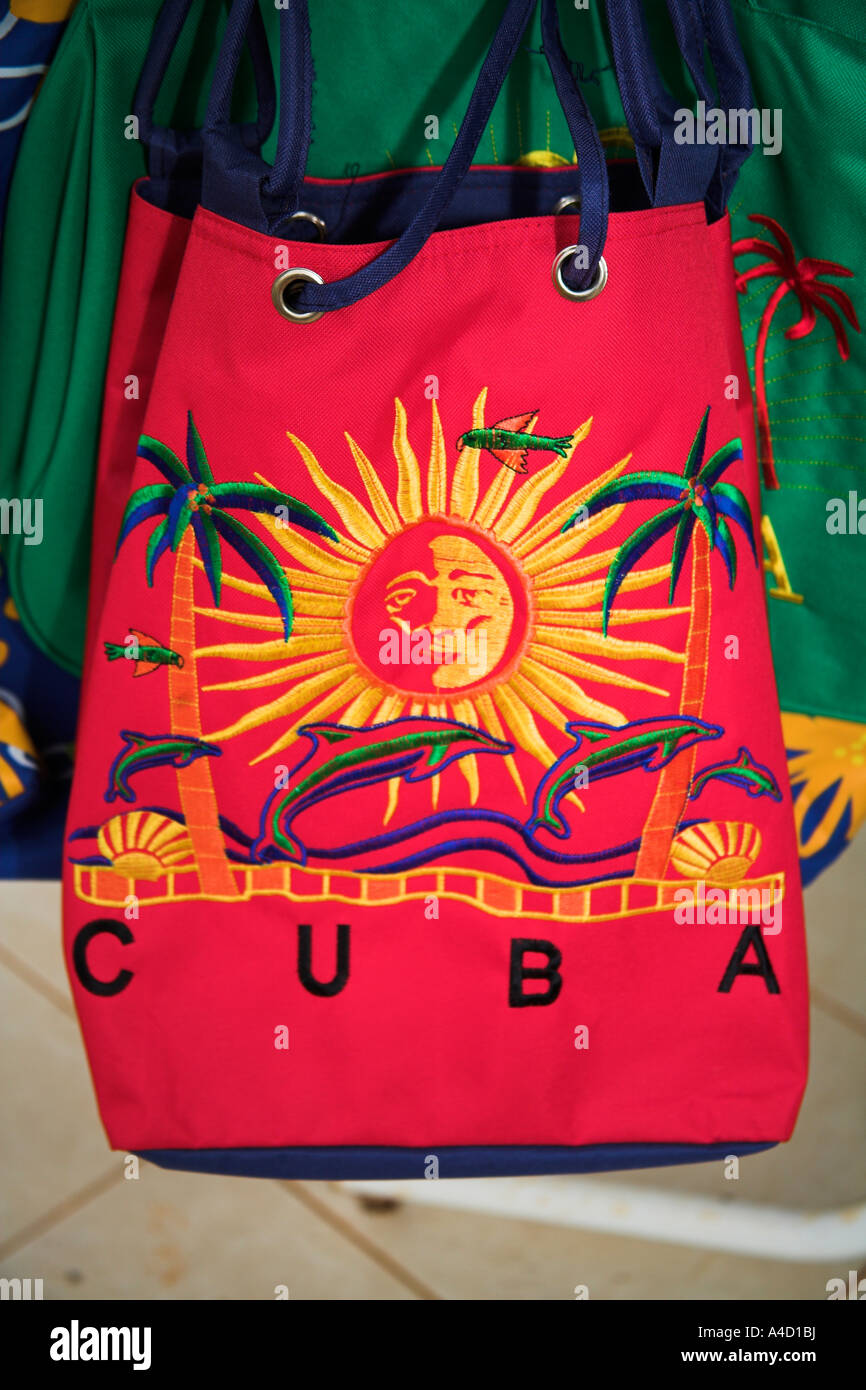 Brightly coloured Cuba shopping bag on display outside a shop, Havana ...