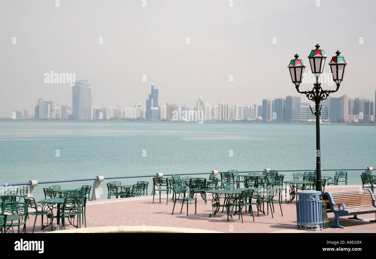 Restaurant in Abu Dhabi city with a backdrop of the gulf and the city skyline, UAE Stock Photo
