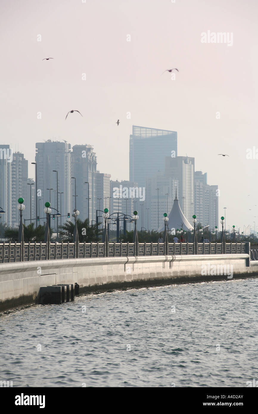 A distant view along the Corniche, and modern buildings, Abu Dhabi city, UAE Stock Photo