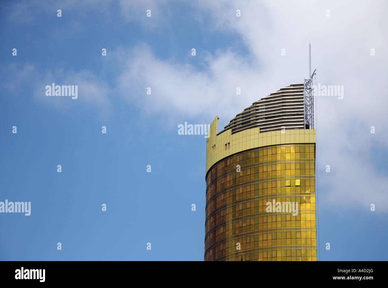Golden skyscraper, modern Abu Dhabi city, UAE Stock Photo