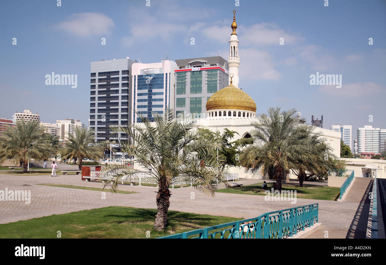 Mosque and modern skyscrapers, Abu Dhabi city, UAE Stock Photo