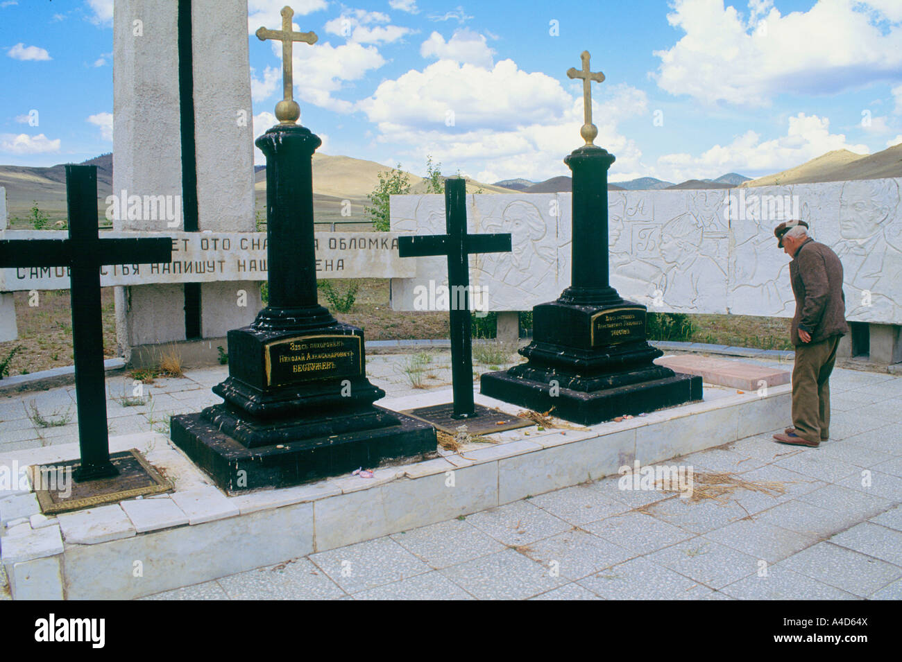 [Old Russian man] looking at graves of 'Decembrists' 19th Russian Dissidents Novoselenginsk, Buriatya [Eastern Siberia] , RUSSIA Stock Photo