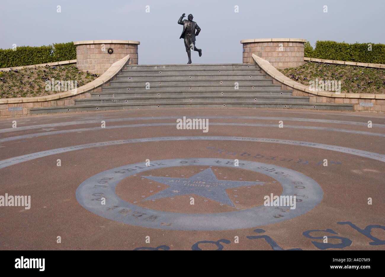 Bronze statue of Eric Morecambe on the seafront at Morecambe