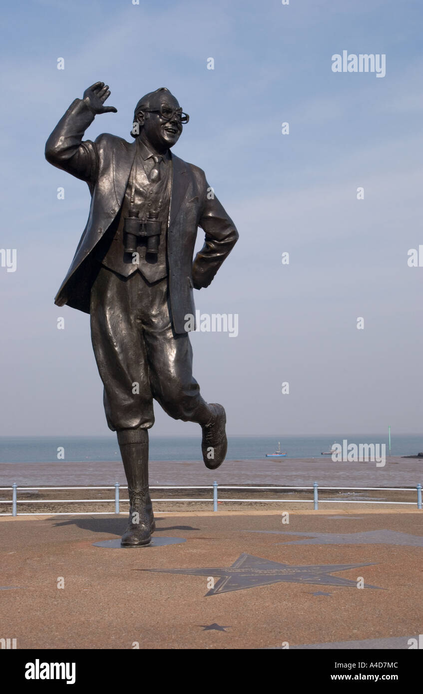 Bronze statue of Eric Morecambe on the seafront at Morecambe