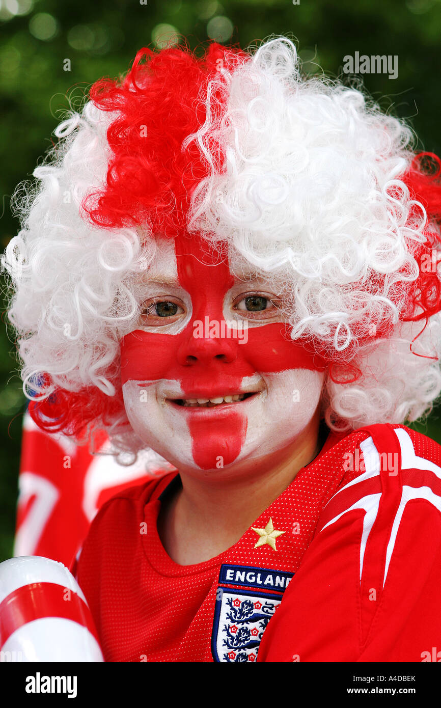 Youngster, face painted with England flag, football supporter. Stock Photo