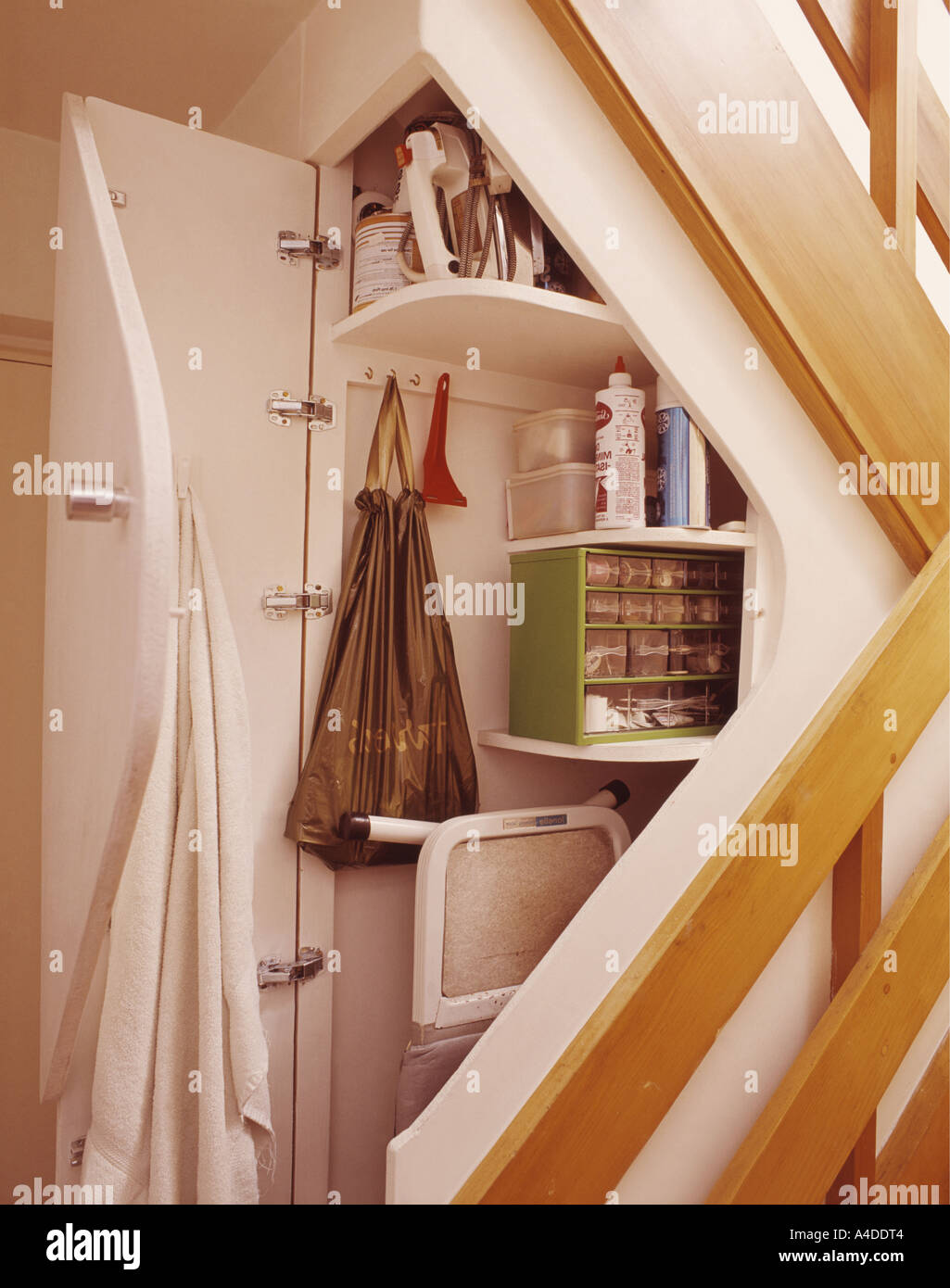 Laundry Storage Under Stairs Stock Photo Alamy