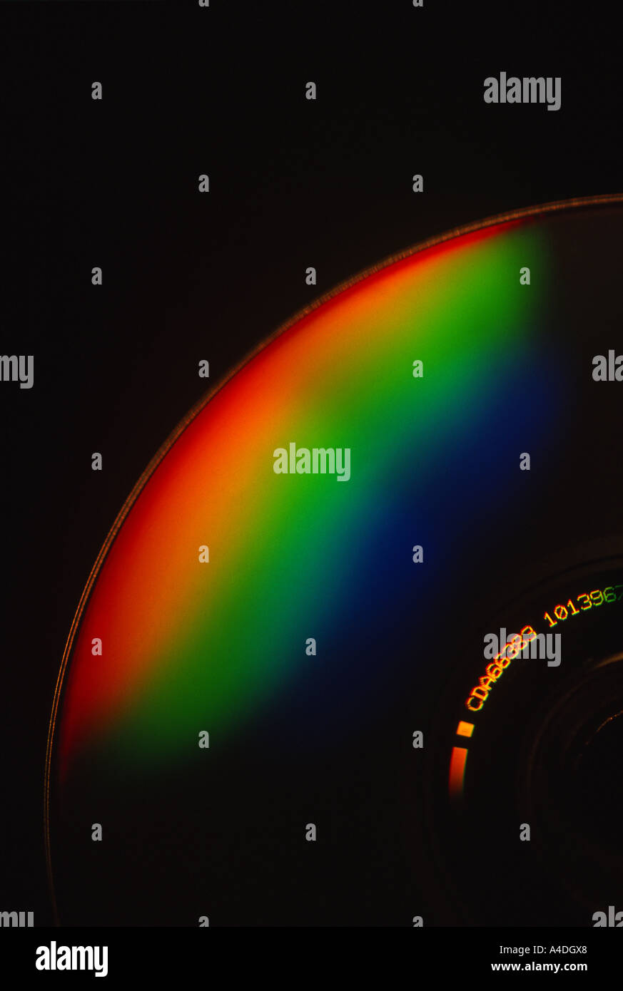 Spectral colours on portion of a compact disc. Stock Photo