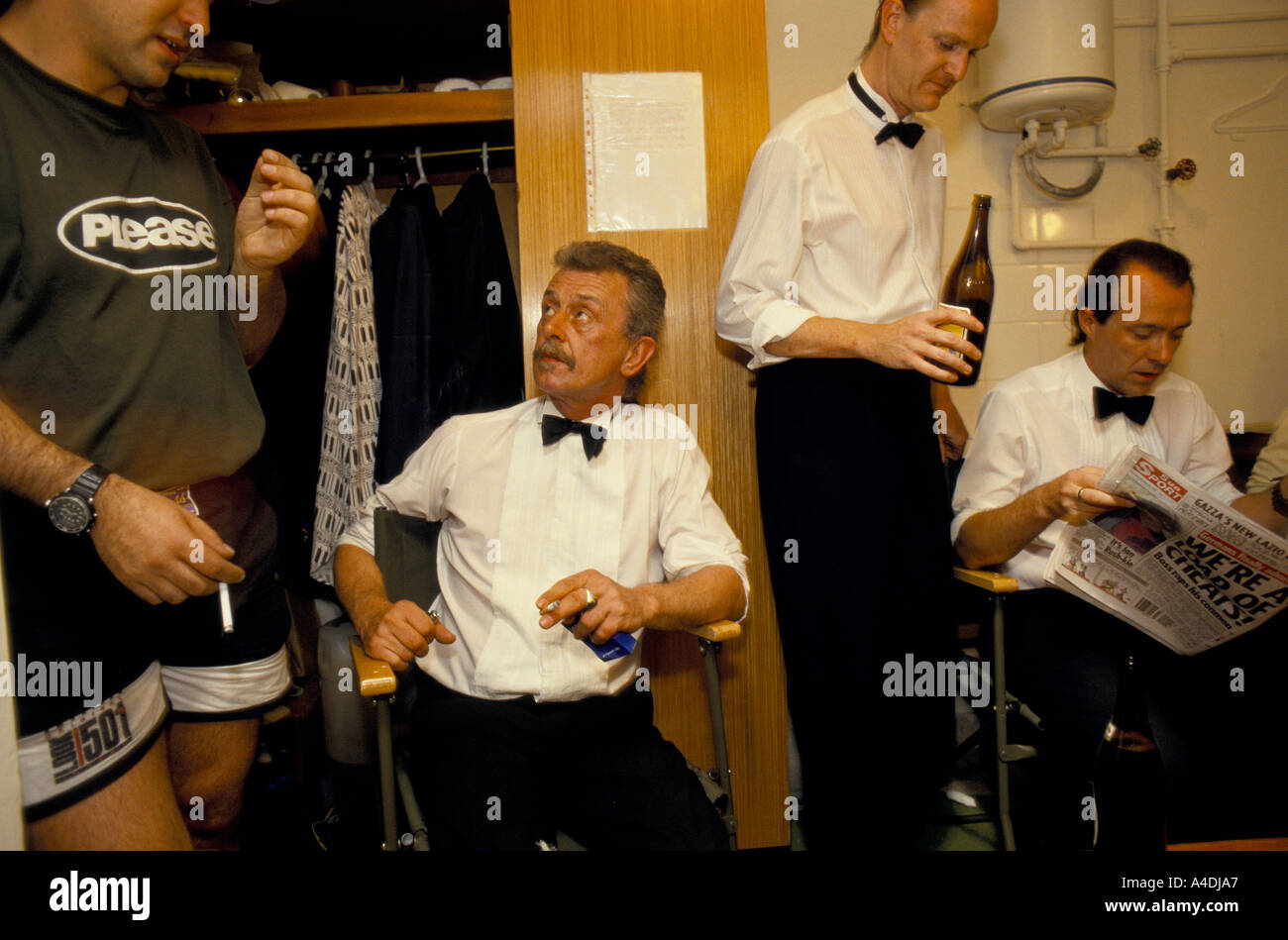 Men having a beer backstage Stock Photo