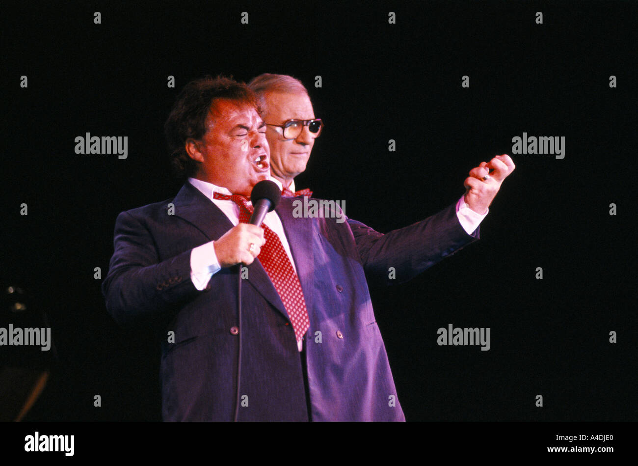 Eddie Large on stage with a musician 1992 Stock Photo