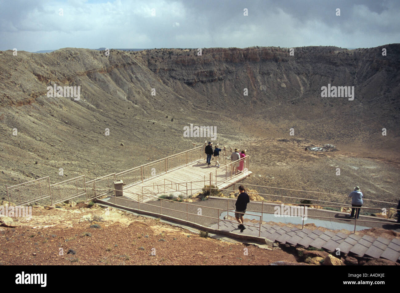 Tourists on viewing platform at Barringer Meteor Crater in the Arizona ...