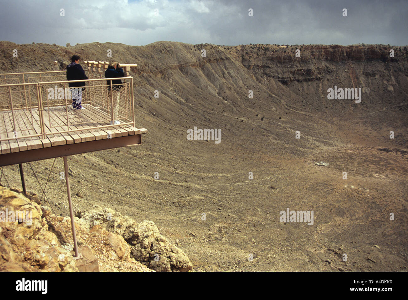 Tourists on viewing platform at Barringer Meteor Crater in the Arizona